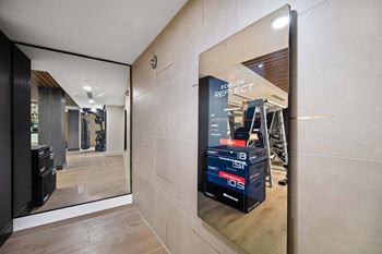 24-Hour fitness center with echelon reflect mirror & bikes